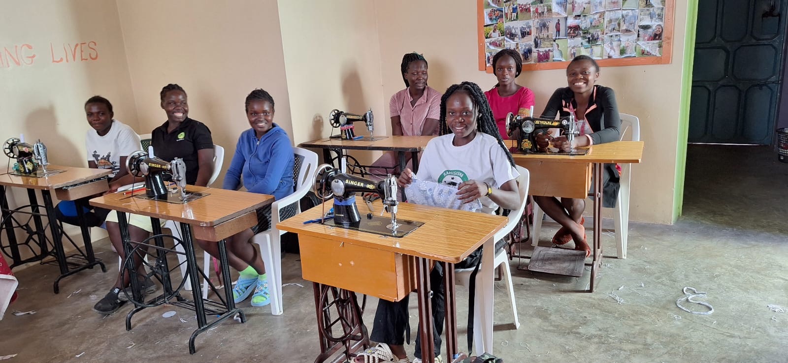 OnCourse vocational tailoring students seated at sewing machines
